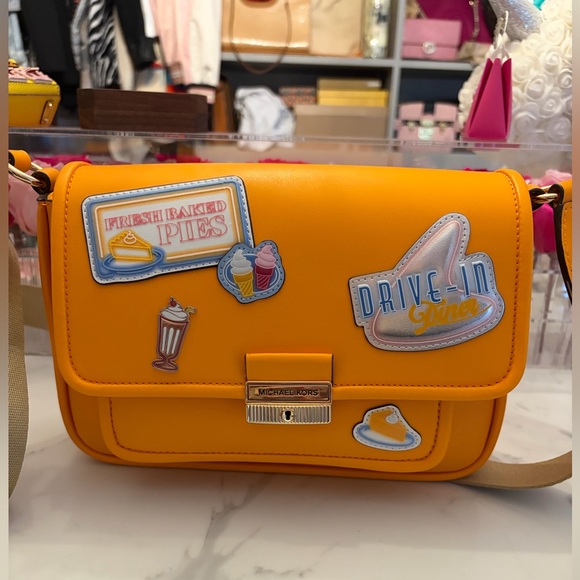 Michael Kors Handbags - NWT Bradshaw medium-sized embellished messenger bag